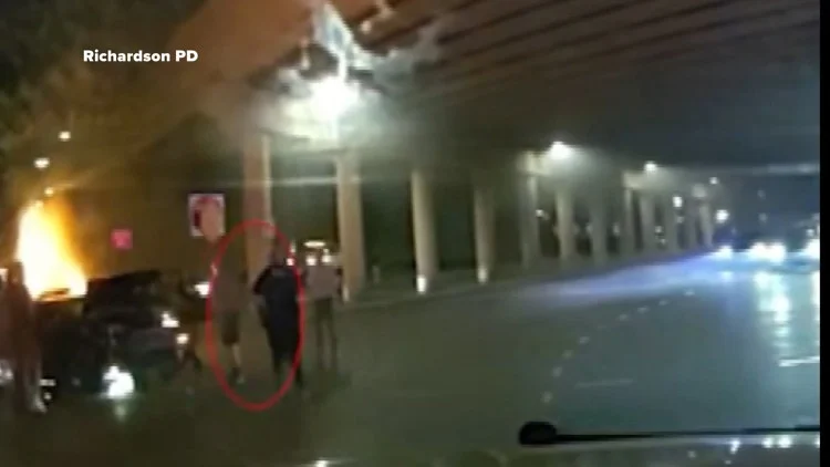 Dramatic video shows Texas police save driver pinned in...