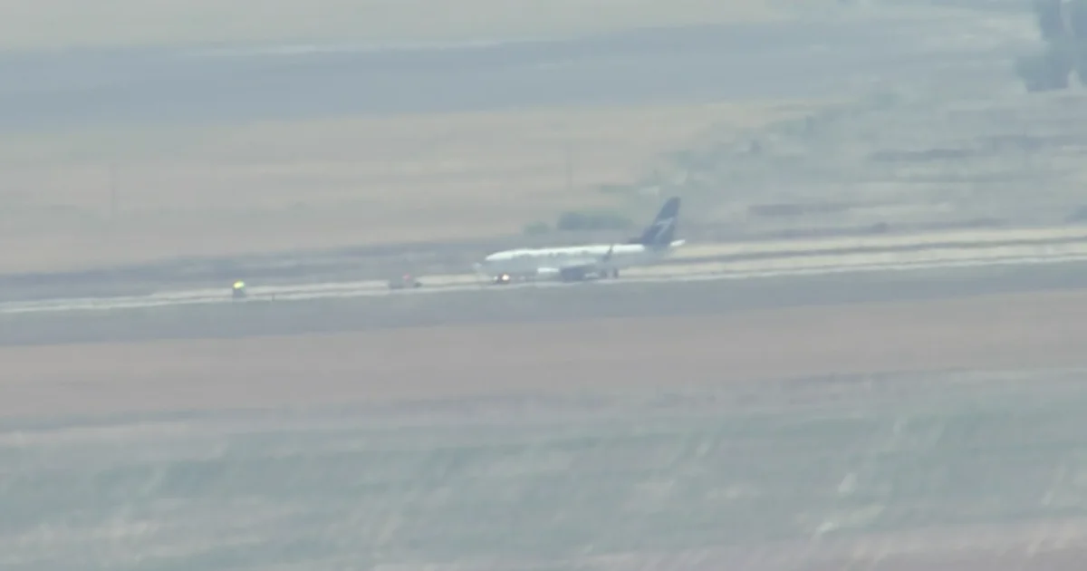 WestJet passengers deplaned, bused back to terminal at...