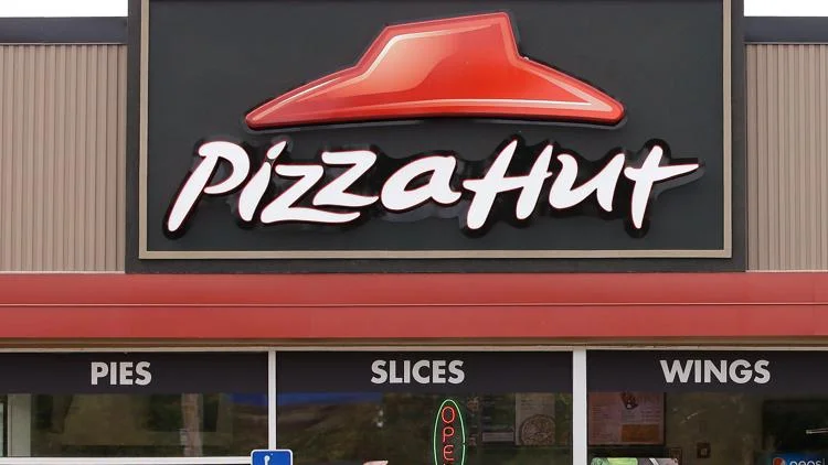 Got a Pizza Hut BOOK IT! button from any year? You can...