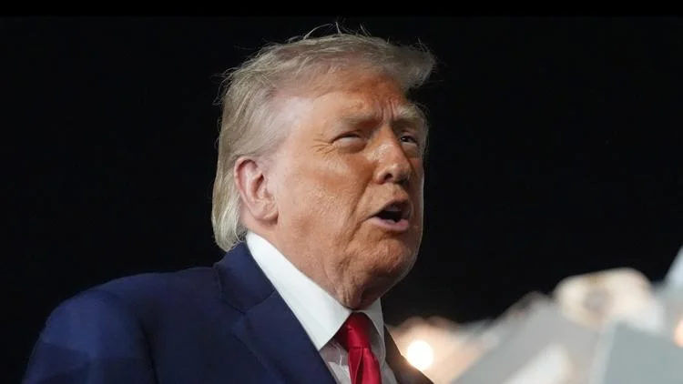 Trump signs bill giving nearly $70B to his immigration...