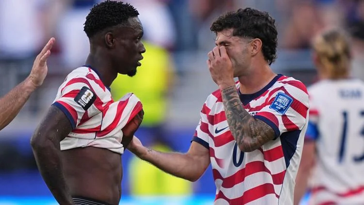 US forward Folarin Balogun got a red card. What does...