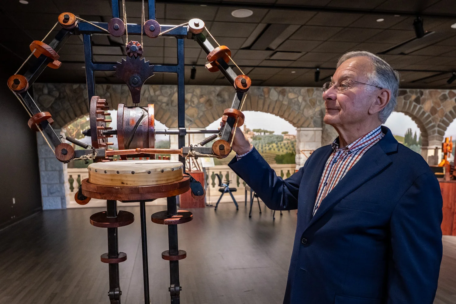 Models of flying machines, drum playing wooden robots...