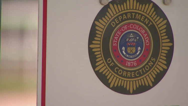 Four Colorado corrections officials shared hundreds of...