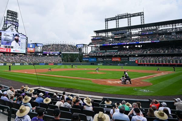 Rockies' Late-Game Collapse Disappoints Packed Denver Crowd as Braves Rally for 12-4 Win